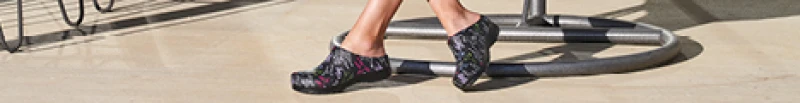 Shop Dansko Kane clogs, the brand's lightweight molded slip-on